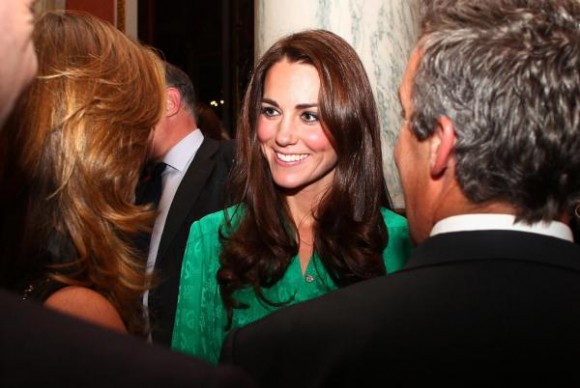 Kate wore a green Mulberry dress to the Buckingham Palace press reception. Photo © British Monarchy Flickr