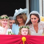 Kate on the balcony with her mum and bridesmaids