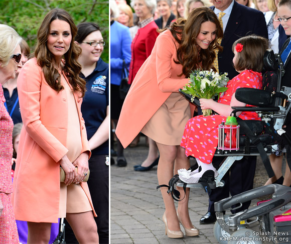 kate visits hospice wearing peach/coral colour outfit