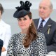 kate wears a dalmatian/leopard print coat to event