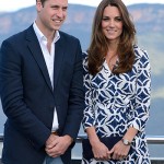 Kate carrying the muse clutch bag
