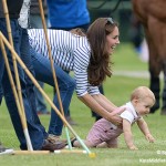 Kate chases after Prince George at the polo today
