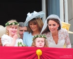 Kate shows her maternal side on the balcony