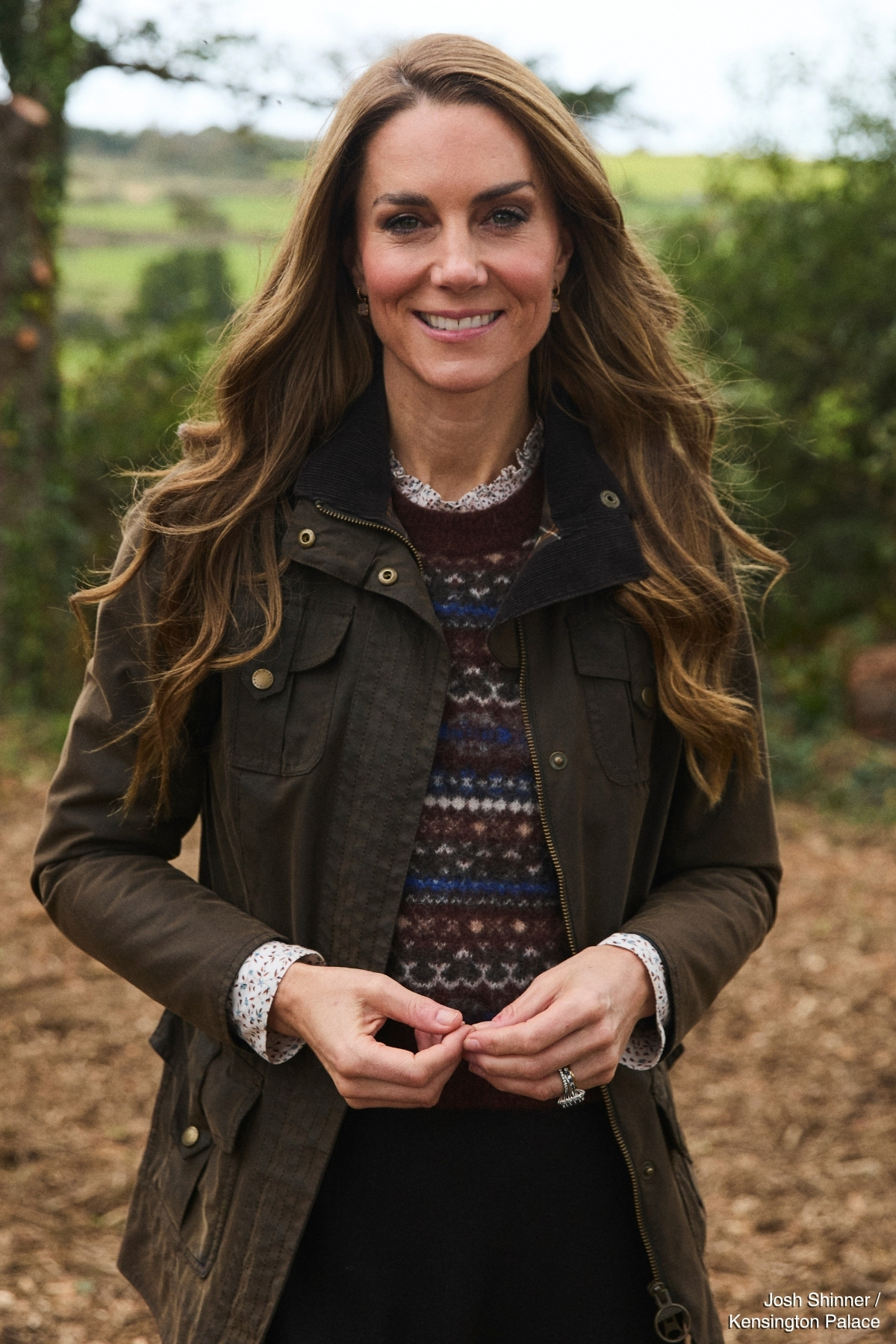 Kate Middleton in her ME+EM jumper, Barbour jacket and Missoma earrings
