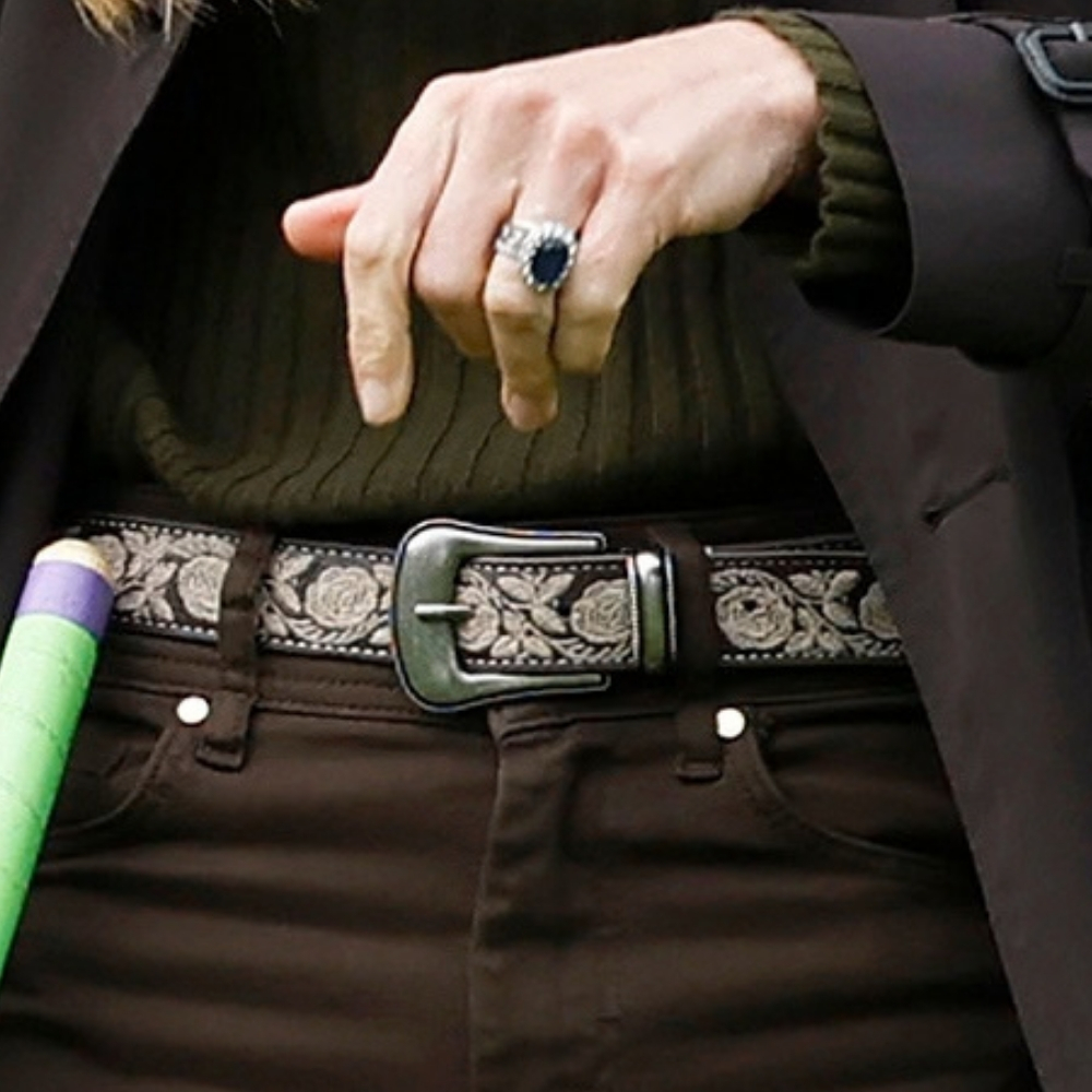 Close-up of Kate Middleton wearing the embroidered Maison Hôtel Guadalupe Belt with her brown trousers