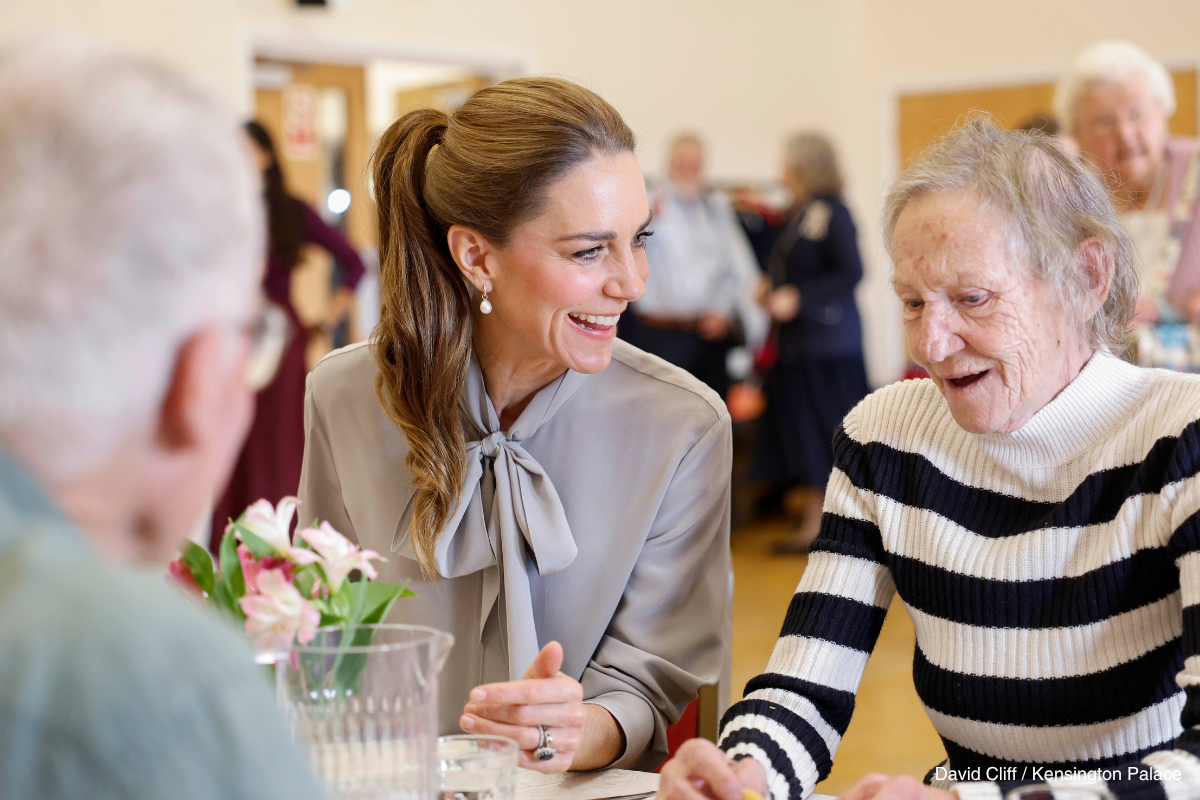 Kate Middleton chatting with a lunch club guest at Pulborough Village Hall