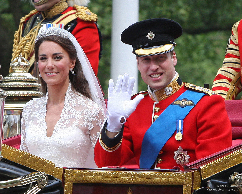 William and Kate wave from the carriage on their wedding day