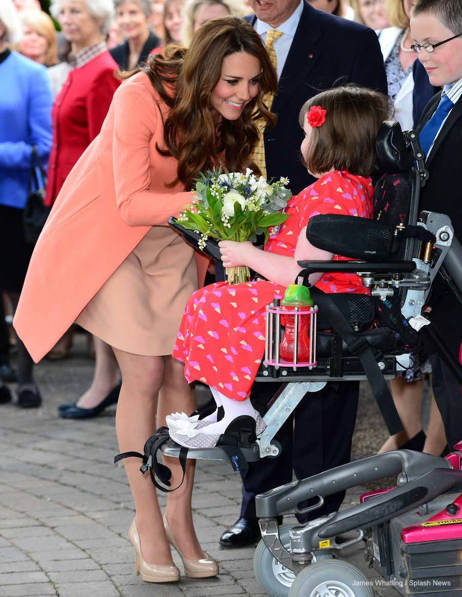 Kate Middleton visiting Naomi House Hospice wearing peach in 2013