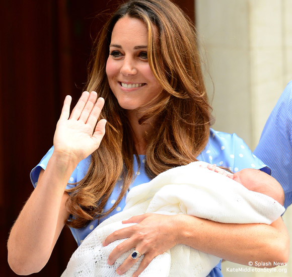 Kate Middleton holds her baby boy, the new prince of Cambridge