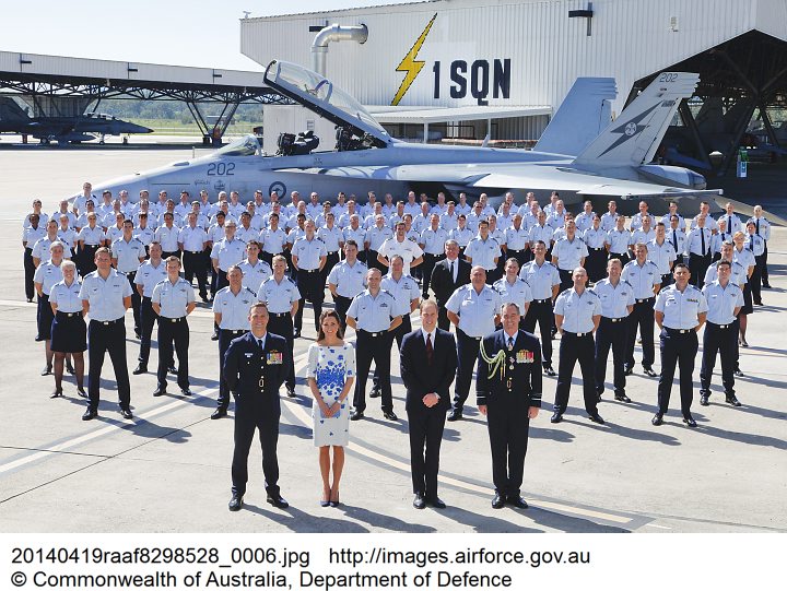 Their Royal Highnesses, the Duke and Duchess of Cambridge, Chief of Air Force, Air Marshal Geoff Brown, AO and Commanding Officer No.1 Squadron Wing Commander Stephen Chappell (left) form the front row for a commemorative Squadron photograph.
