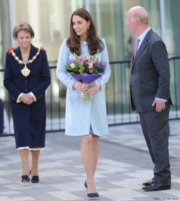 Kate Middleton wearing her blue Seraphine Maternity coat while pregnant with Princess Charlotte
