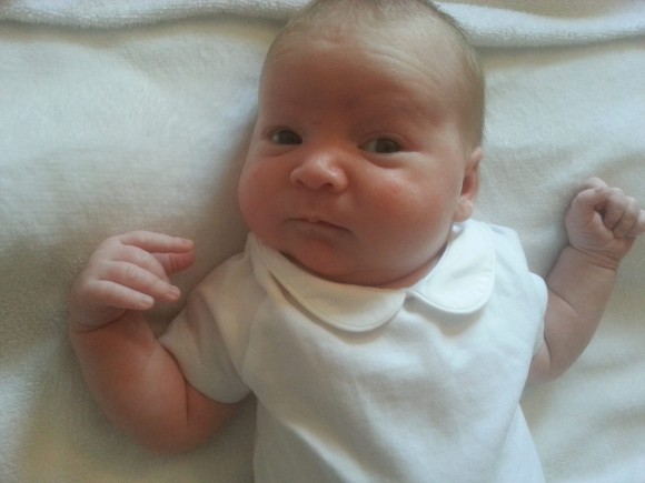 Baby Tommy wears the Trotters Milo Body
