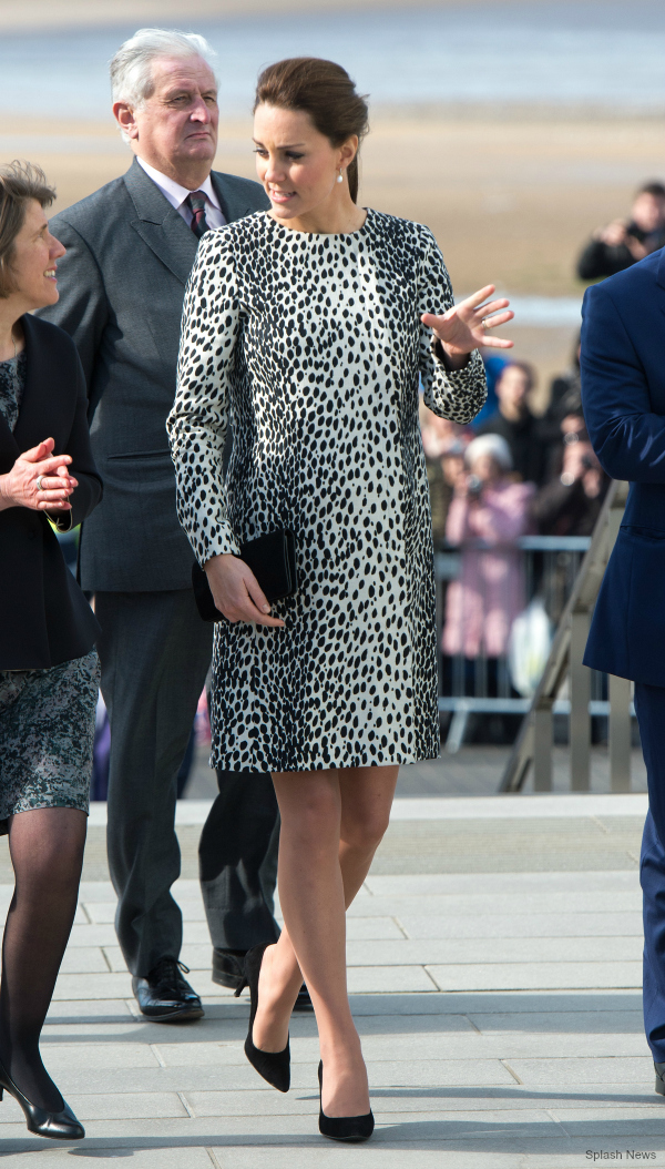 Kate wears a black and white spotty Dalmatian print coat in Margate today