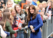 Duchess of Cambridge / Kate Middleton visits Dundee carrying the Stuart Wetizman Muse Clutch Bag in black suede