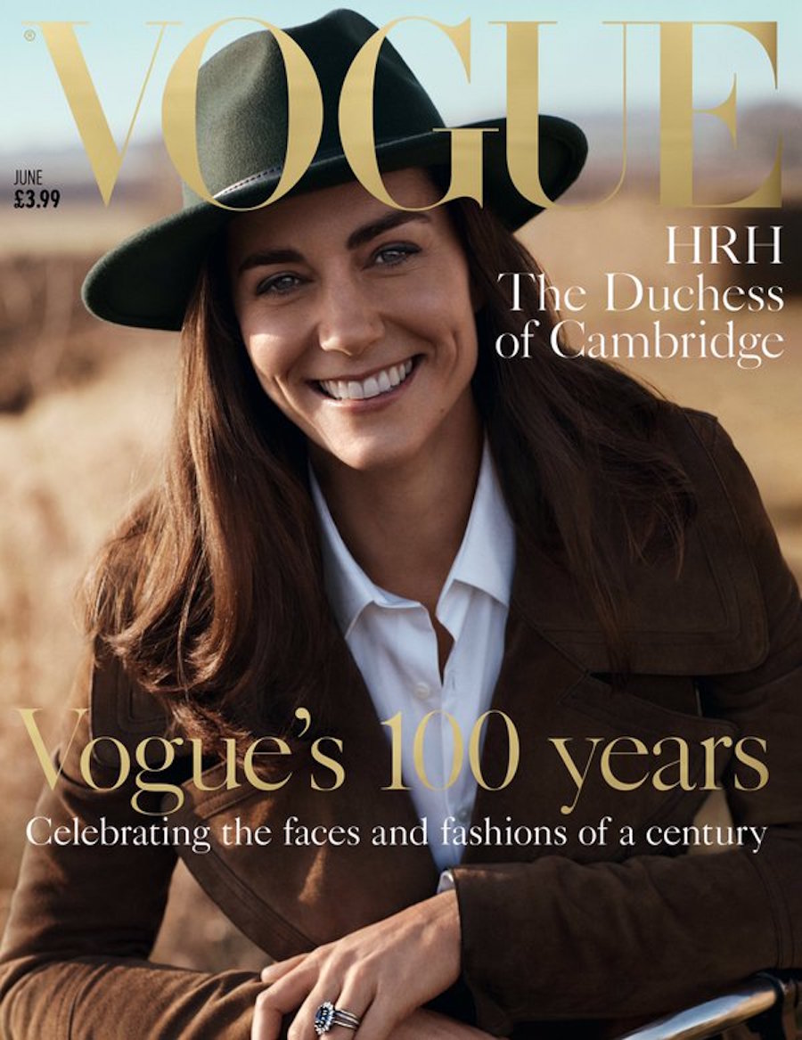 Kate Middleton on the cover of Vogue magazine, wearing a hat, suede jacket and smiling.