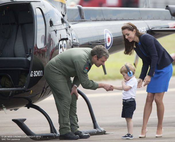 The Royal International Air Tattoo 2016 (RIAT 2016) takes place at RAF Fairford from 8th to 10th July . Notable events around RIAT 2016 include the first UK flying displays by the F-35, the P-8A Poseidon Maritime Seedcorn Project. Personel and events to mark the 75th anniversary of the RAF Air Cadets. The Airshow’s theme is ‘The Next Generation: Inspiring Innovation’ which accords with the RAF’s major themes of 2016-17. The Duke And Dutchess Of Cambridge William with Prince George visits the Royal International Air Tattoo. Pictured. Prince George shaking the hand of Flt Lt Jim Hobkirk from the Central Flying School Exam Wing.