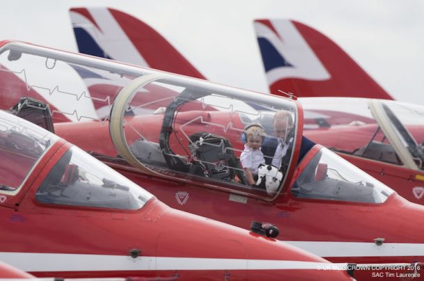 The Royal International Air Tattoo 2016 (RIAT 2016) takes place at RAF Fairford from 8th to 10th July . Notable events around RIAT 2016 include the first UK flying displays by the F-35, the P-8A Poseidon Maritime Seedcorn Project. Personel and events to mark the 75th anniversary of the RAF Air Cadets. The Airshow’s theme is ‘The Next Generation: Inspiring Innovation’ which accords with the RAF’s major themes of 2016-17. The Duke And Dutchess Of Cambridge William with Prince George visits the Royal International Air Tattoo. Pictured. Prince George is looking inside the cockpit of a RAF Red Arrows Hawk under the watchful eye of Prince William