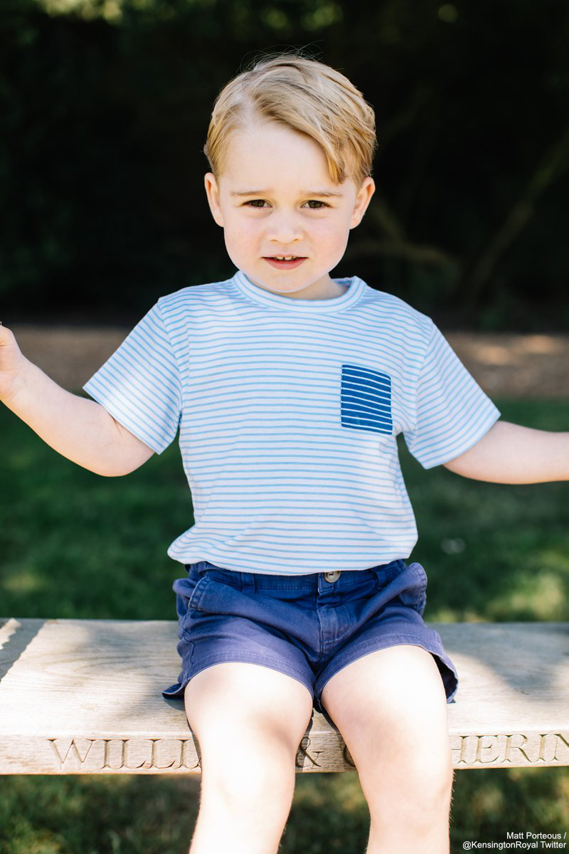 Prince George sat on the swing featuring his parents' names