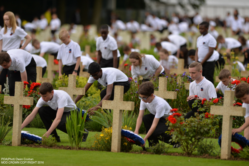Image shows school children from the UK and France laying wreaths for those who had fallen during the battle of the Somme. Members of the Royal Family have joined the Prime Minister and representatives of allies and former enemies, together with hundreds of Armed Forces personnel and 10,000 guests to mark the centenary of the Battle of the Somme at an international service of commemoration in France.Representatives of all the regiments that took part in the conflict 100 years ago attended the service at the Thiepval Memorial along with a Guard of Honour from the Irish Guards and guns of the King’s Troop Royal Horse Artillery.Servicemen and women took part in the service, reading moving accounts of the battle from those who went over the top on the 1 July 1916.The King’s Troop Royal Horse Artillery fired their guns to mark the end of a period of silence, and wreaths were laid at the Cross of Sacrifice.The guns are 13 Pounder Quick Fire guns, and saw service in the First World War. art in commemorative services in both Thiepval and Manchester.