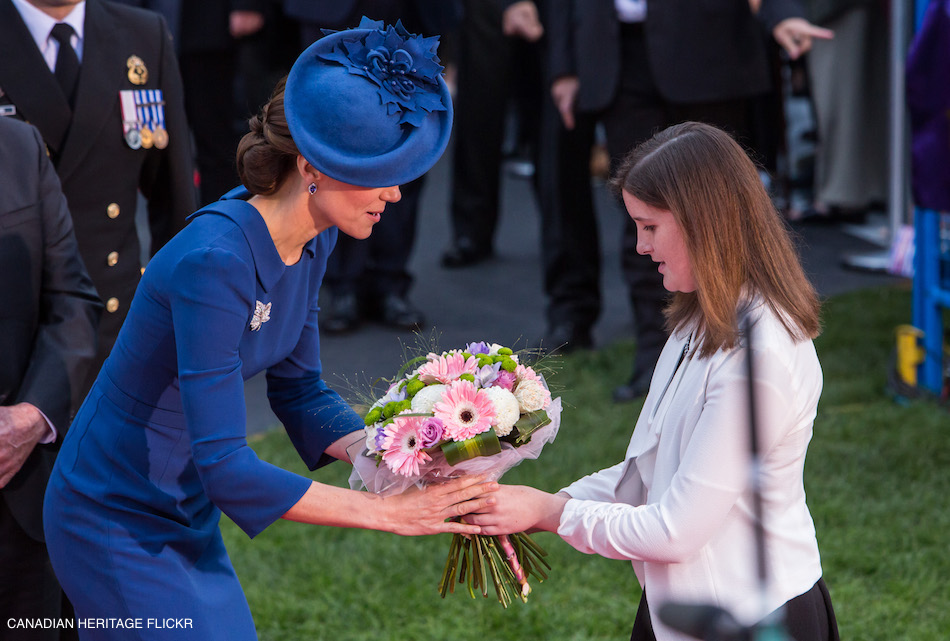 Kate is handed flours during the Canada Tour