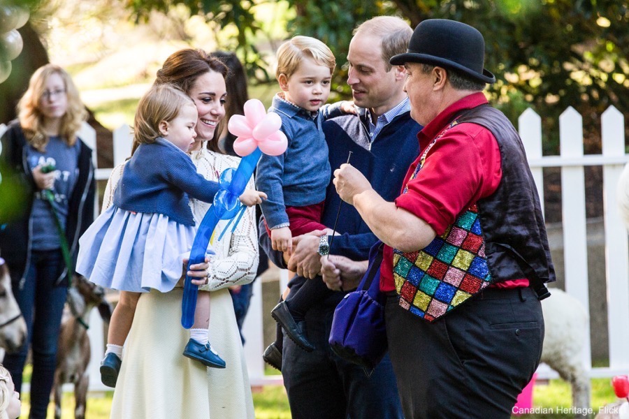 George and Charlotte receive balloon animals