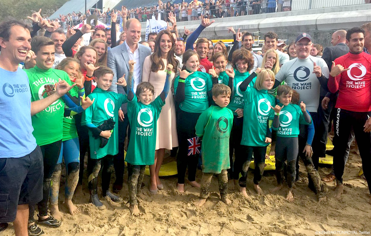 William and Kate posing with children from the Wave Project