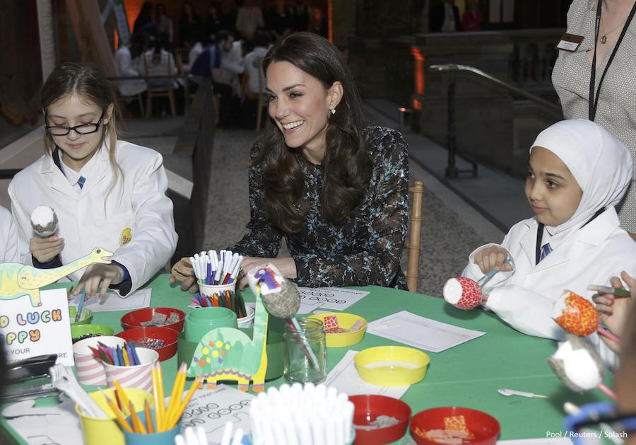 Kate Middleton doing arts and crafts with schoolchildren