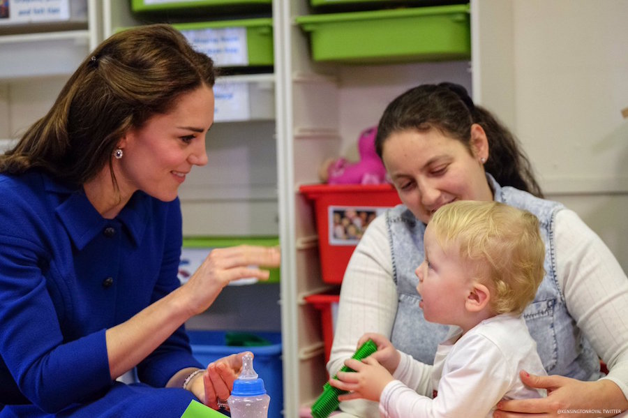 Kate Middleton playing with a child