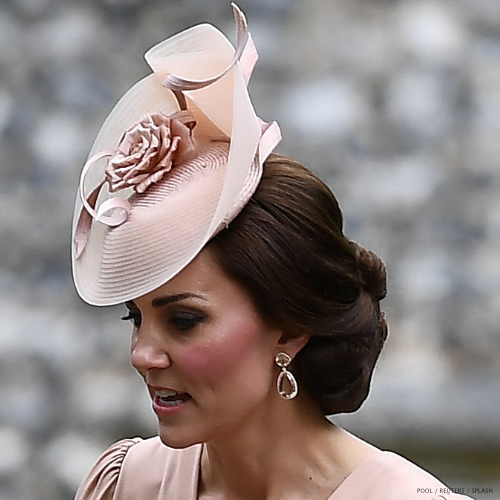 Pippa Middleton wearing her pink Jane Taylor hat and Kiki McDonough earrings at Pippa Middleton's wedding