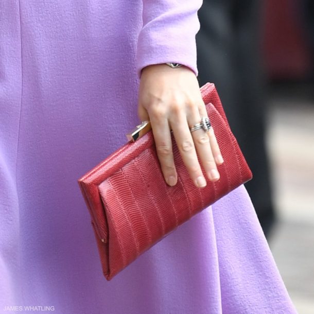 Kate Middleton carrying a red Anya Hindmarch clutch bag