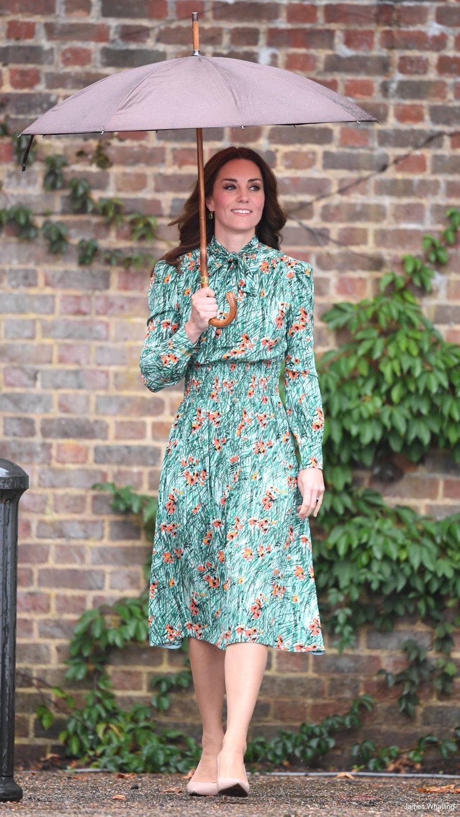 Kate Middleton wearing a Prada dress and L.K. Bennett shoes during a visit to the White Garden