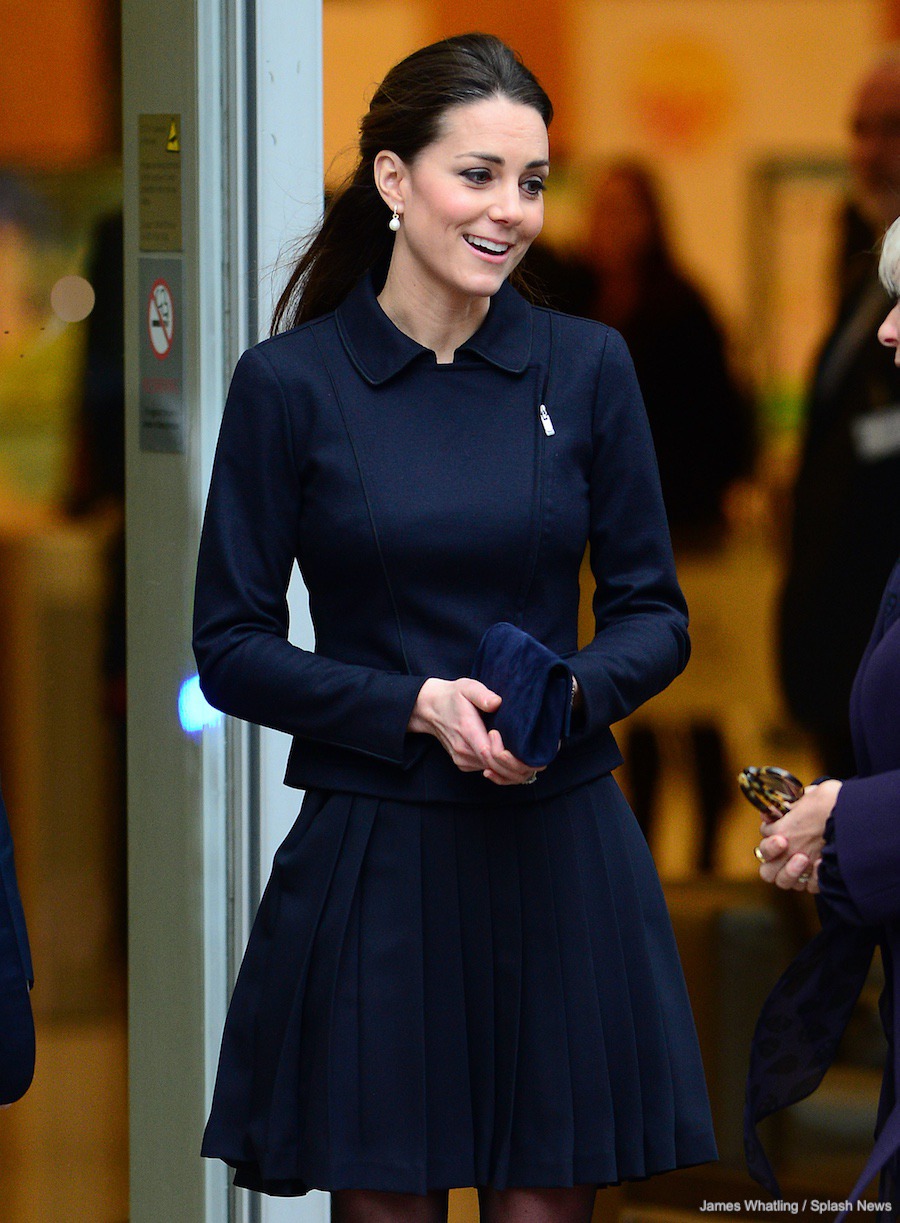 Kate Middleton wearing a Max Mara jacket during a visit to the Place2Be Forum