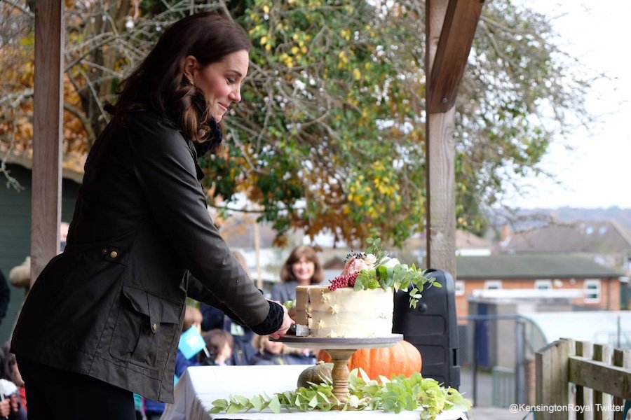 Kate cutting a cake