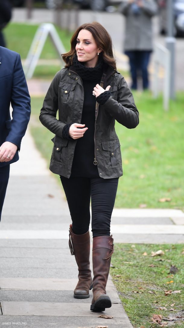 Kate Middleton wearing a Barbour Coat and Penelope Chilvers boots at Robin Hood School in London