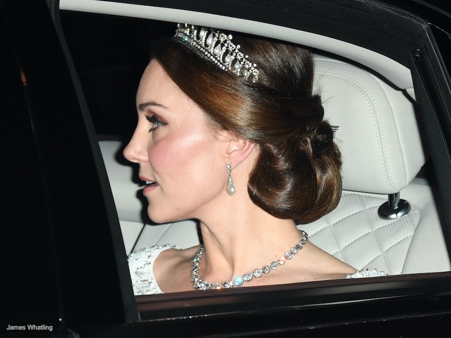 Kate Middleton in a car on the way to the 2017 Diplomatic Reception. She's wearing a pair of pearl earrings that once belonged to Princess Diana.
