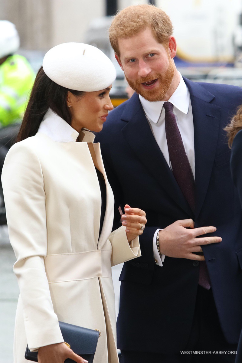 Prince Harry and Meghan Markle at the 2018 Commonwealth Service. Meghan wore a white coat by Amanda Wakeley