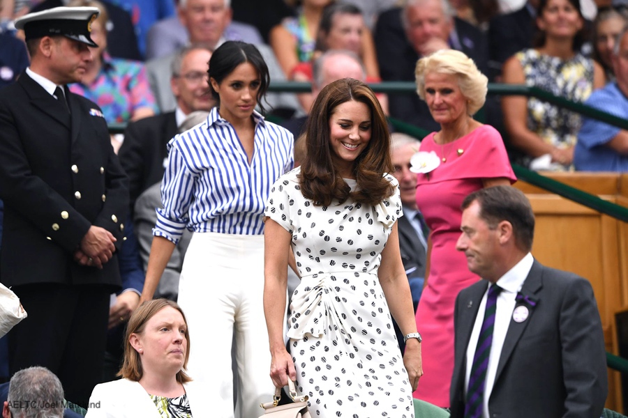 The Duchess of Cambridge (Kate Middleton) and the Duchess of Sussex (Meghan Markle) at Wimbledon 2018