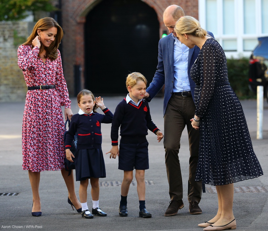 Ms Haslem, Princess Charlotte's teacher, wore a navy blue polka dot dress by L.K. Bennett