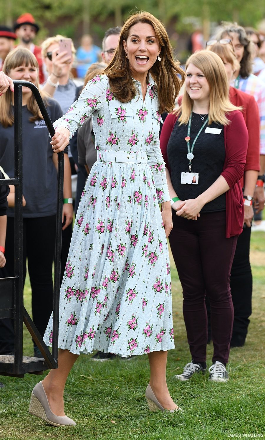 Kate Middleton wearing a blue, floral full length dress by Emilia Wickstead 