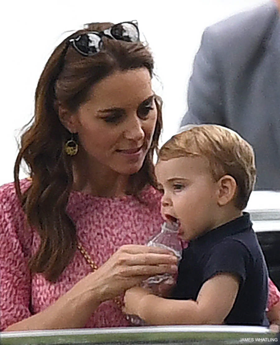 Kate Middleton holding Prince Louis at the polo match