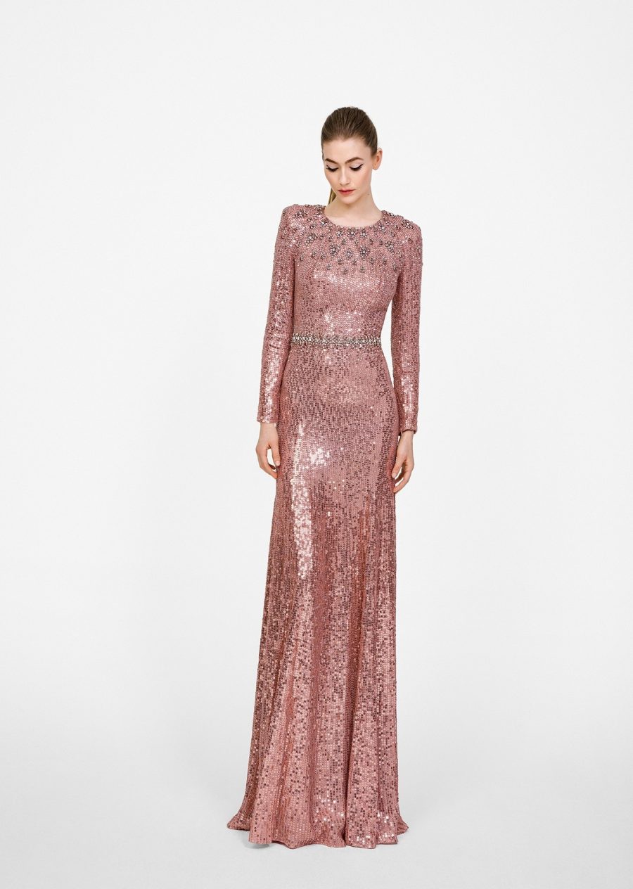 The 'Jenny Packham' Georgia dress adorned with rose gold sequins and crystal embellishments, worn by a model. 