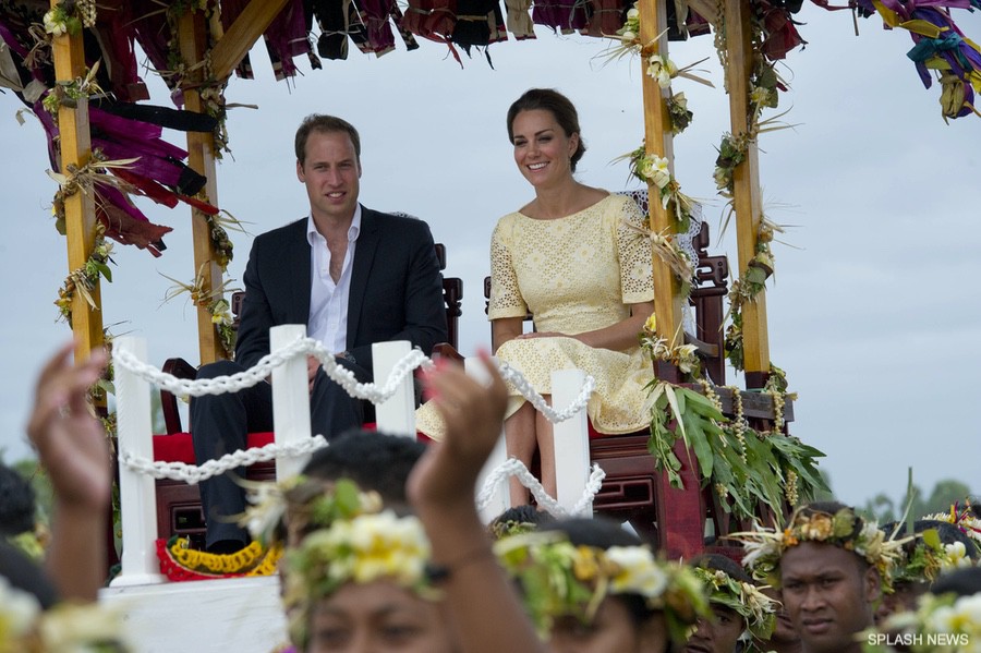 Kate in a yellow dress as she leaves the Solomon Islands and arrives in Tuvalu