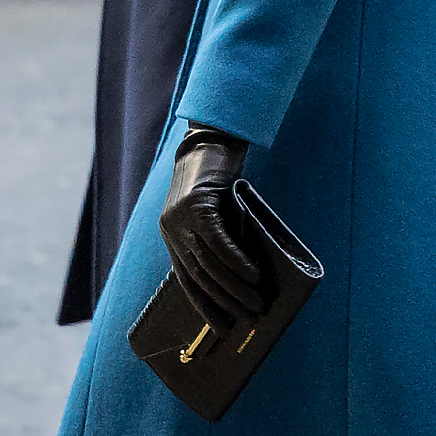 Kate Middleton carrying the black crock Strathberry Multrees Wallet