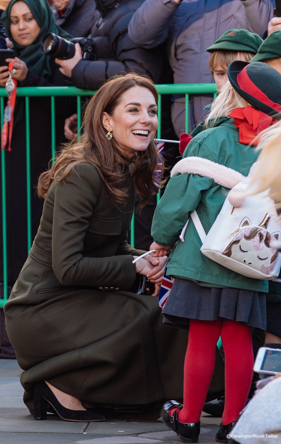 Kate Middleton in black for Aberfan; Adorable baby swipes her bag!