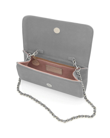 Interior view of the Emmy London Natasha clutch in steel grey suede, showing the soft neutral oyster suede lining, zip pocket, and a detachable silver chain strap.

