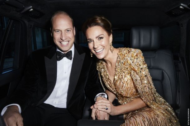 Kate, who is wearing a gold gown, and William, in a tuxedo, sat in a plush car.