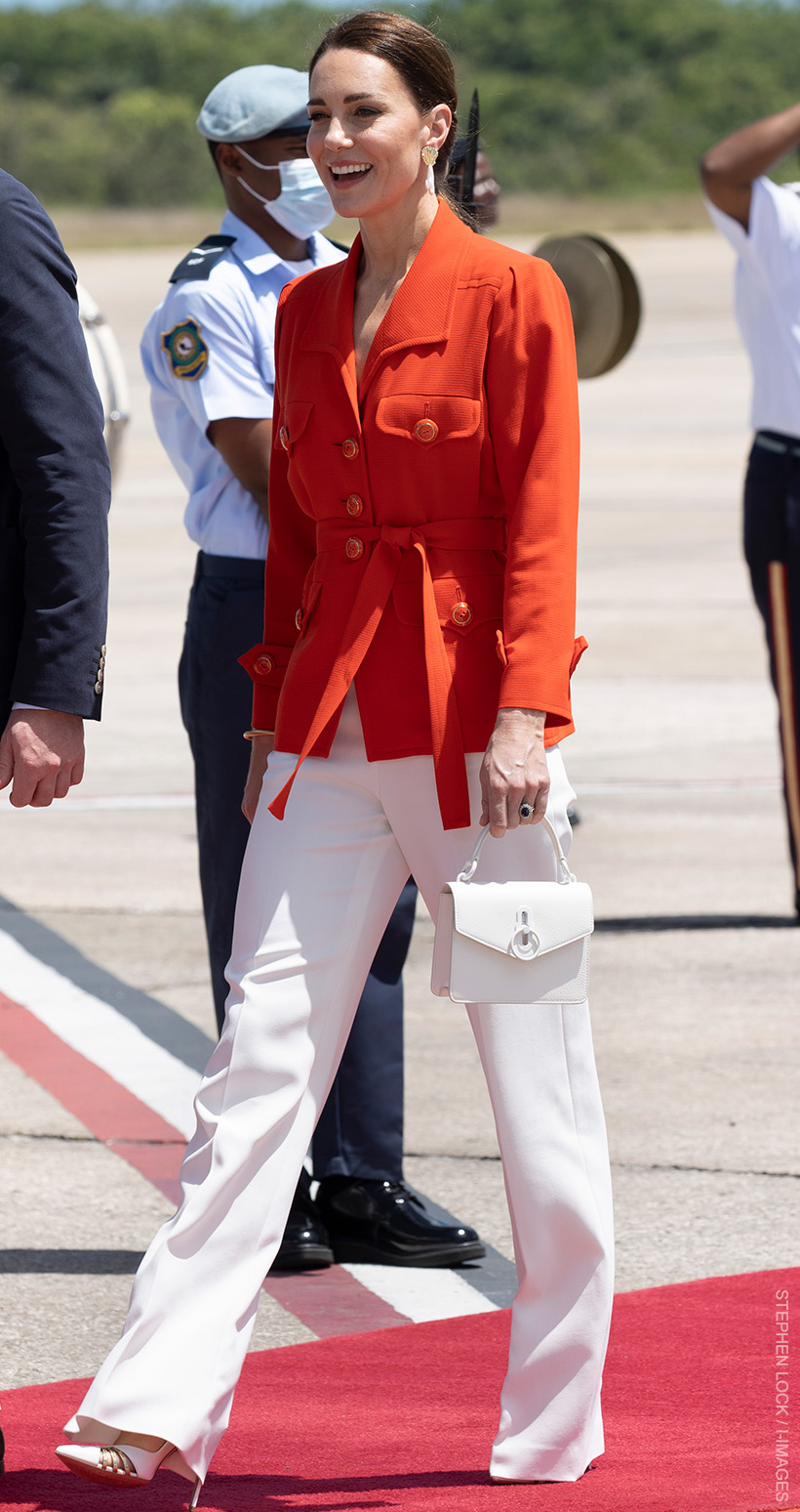 Kate in red vintage YSL jacket for Belize departure + deep sea diving