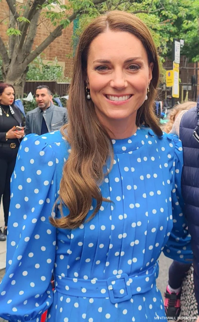 Surprise! Kate in blue polka dot dress as she joins local street party for The Big Jubilee Lunch