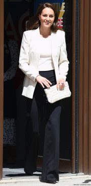 Kate Middleton in Cream Blazer & Black Trousers at Baby Bank