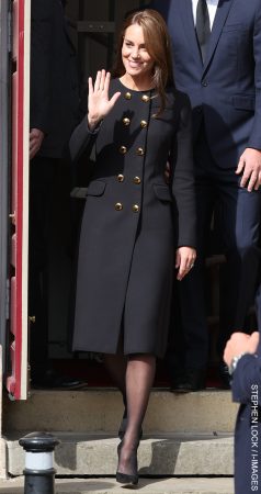 Kate Middleton, the Princess of Wales, wore the black Dolce & Gabbana coat in 2022 during a visit to Windsor